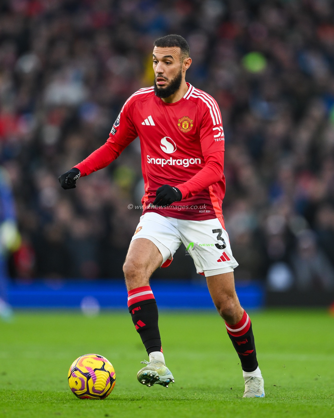 Noussair Mazraoui of Manchester United makes a break with the ball during the Premier League match Manchester United vs Bournemouth at Old Trafford, Manchester, United Kingdom, 22nd December 2024

(Photo by Craig Thomas/News Images)