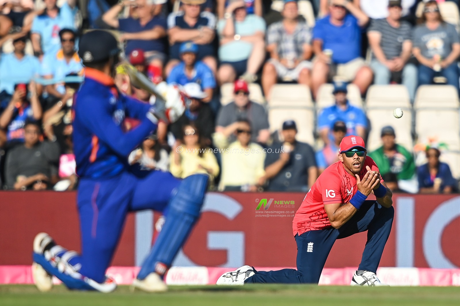 Tymal Mills of England catches Deepak Hooda of India off the bowling of Chris Jordan