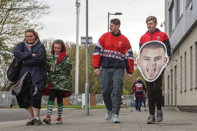 Hull KR fans arrive with a Mikey Lewis of Hull KR face mask during the Betfred Super League round 7 match Hull KR vs Hull FC at Sewell Group Craven Park, Hull, United Kingdom on 03 April 2026

(Photo by Mark Cosgrove/News Images)