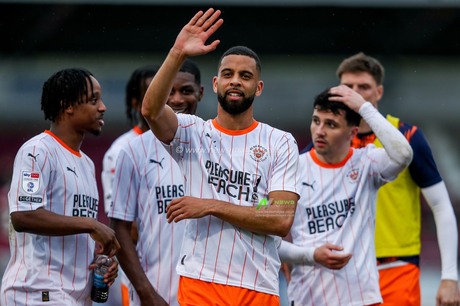 CJ Hamilton of Blackpool acknowledges the fans after the teams victory following the Sky Bet League 1 match Northampton Town vs Blackpool at Sixfields Stadium, Northampton, United Kingdom, 22nd March 2025

(Photo by Izzy Poles/News Images)
