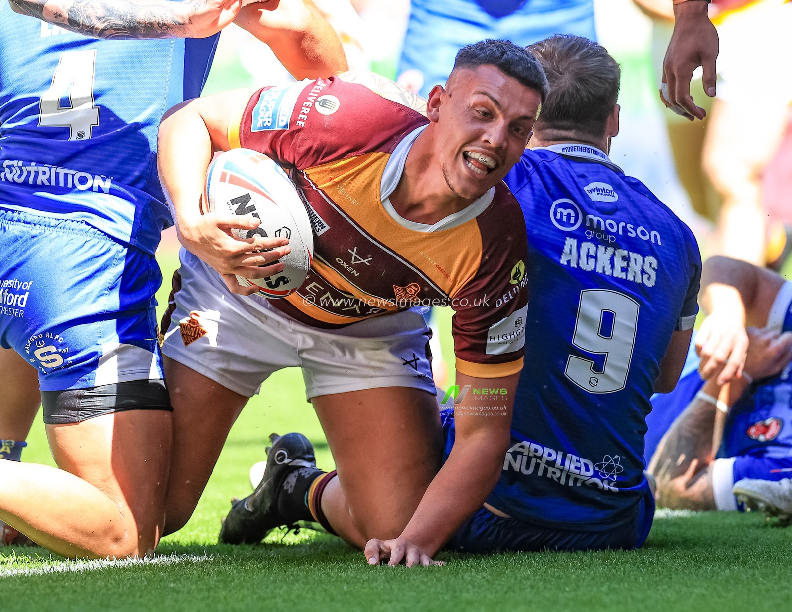Owen Trout #17 of Huddersfield Giants celebrates his try