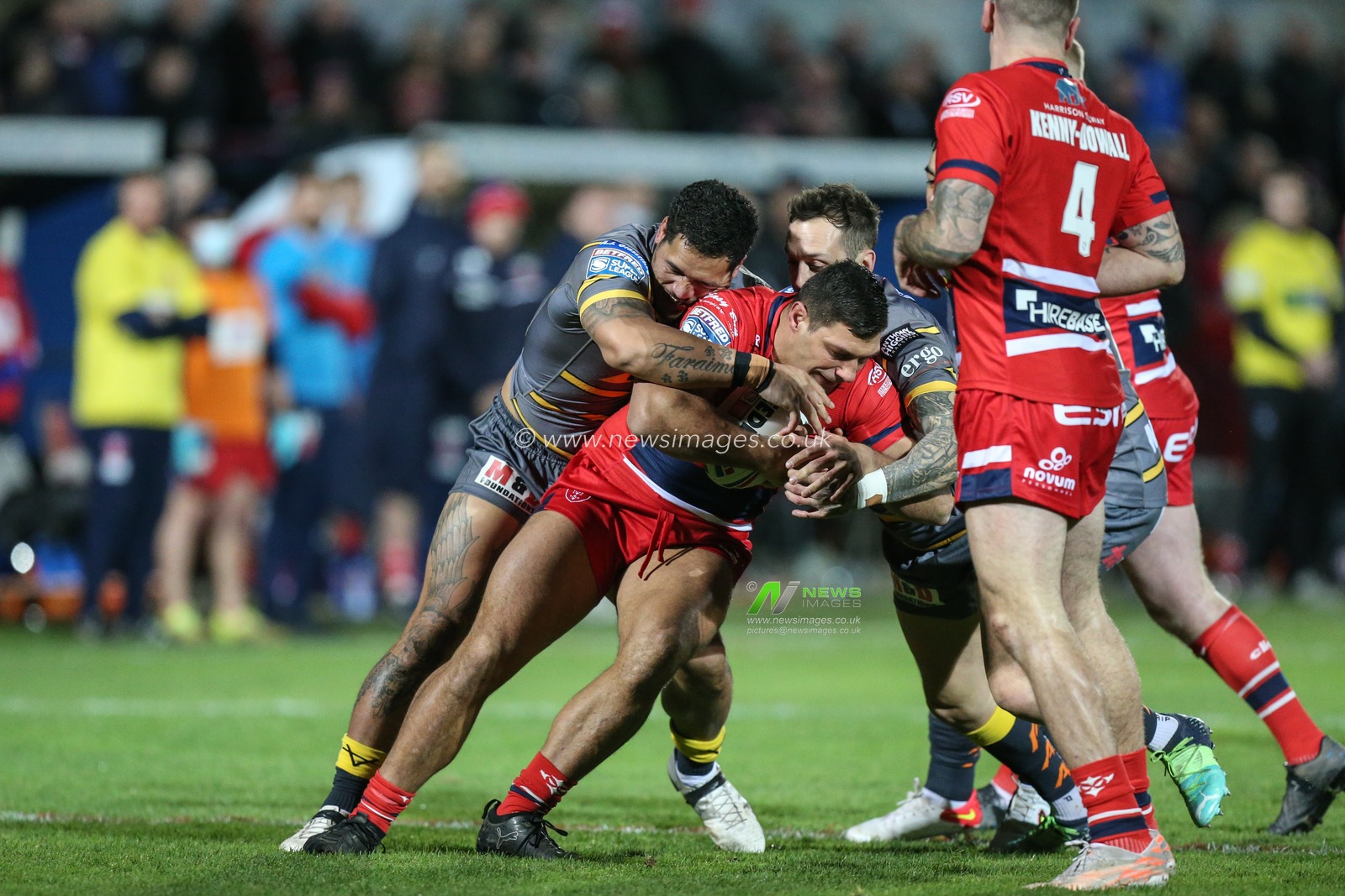 Ryan Hall #5 of Hull KR is tackled by Bureta Faraimo #5 and Gareth O'Brien #31 of Castleford Tigers