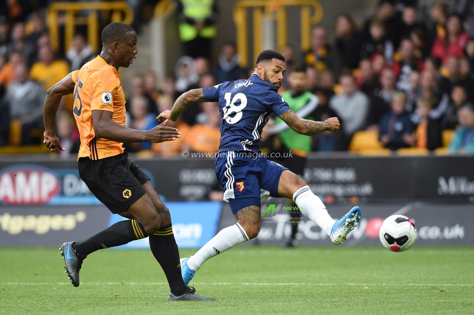 28th September 2019, Molineux, Wolverhampton, England; Premier League, Wolverhampton Wanderers v Watford : Andre Gray (18) of Watford shoots on goal

Credit: Richard Long/News Images