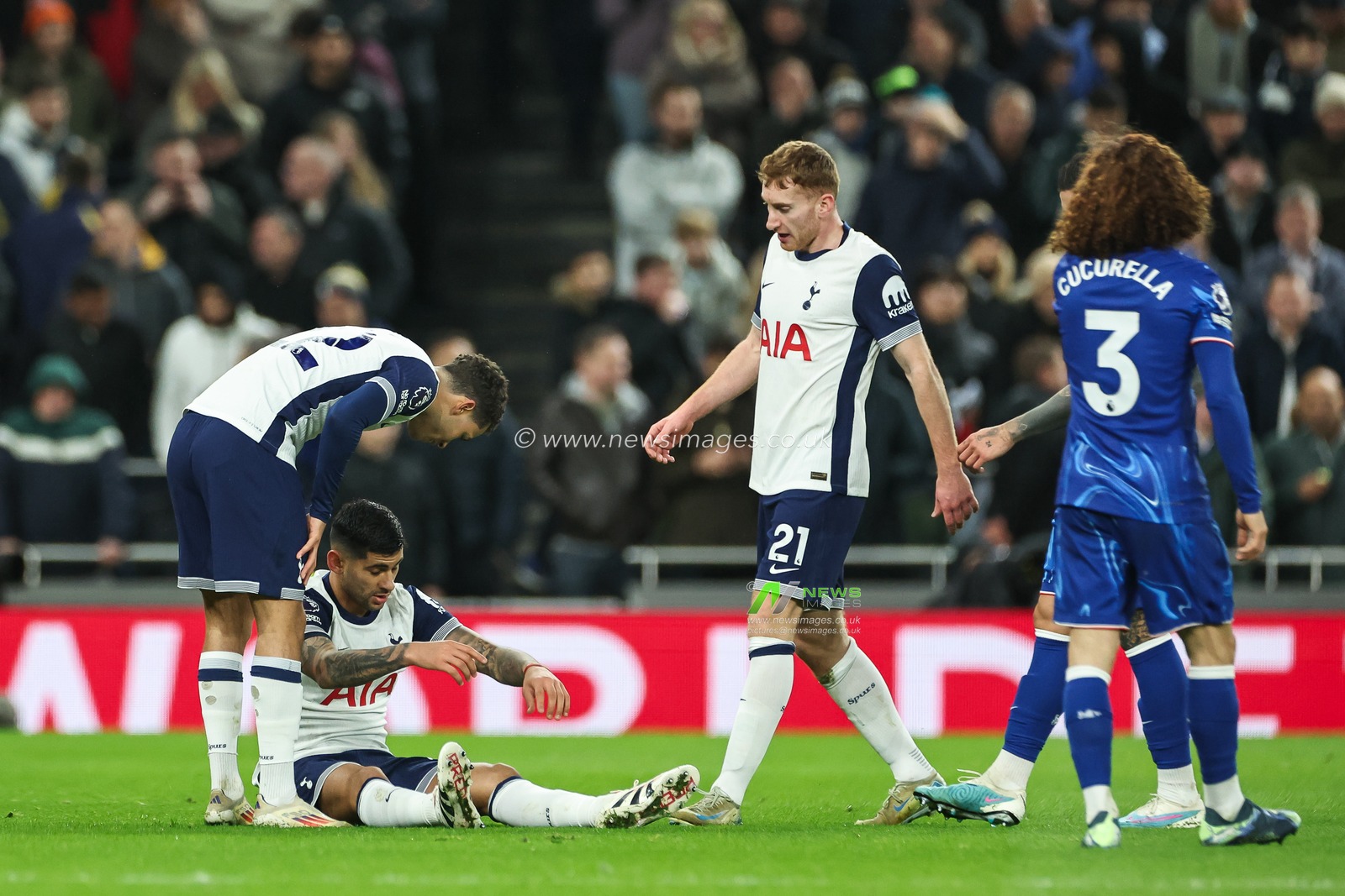 Cristian Romero of Tottenham Hotspur goes down with an injury during the Premier League match Tottenham Hotspur vs Chelsea at Tottenham Hotspur Stadium, London, United Kingdom, 8th December 2024

(Photo by Mark Cosgrove/News Images)