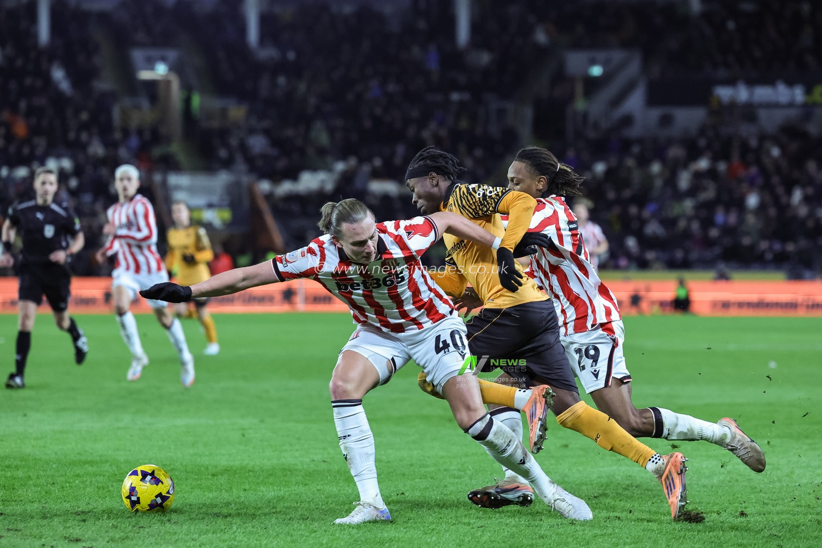 Joel Ndala of Hull City is fouled bay Maksym Talovierov of Stoke City during the Sky Bet Championship match Hull City vs Stoke City at MKM Stadium, Hull, United Kingdom, 1st January 2026

(Photo by Mark Cosgrove/News Images)

*** GER AUT SUI OUT ***