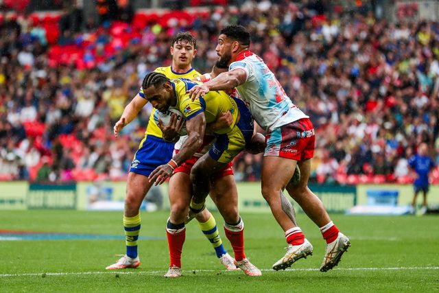 Rodrick Tai of Warrington Wolves is tackled during the Betfred Challenge Cup Final Warrington Wolves vs Hull KR at Wembley Stadium, London, United Kingdom, 7th June 2025

(Photo by Izzy Poles/News Images)