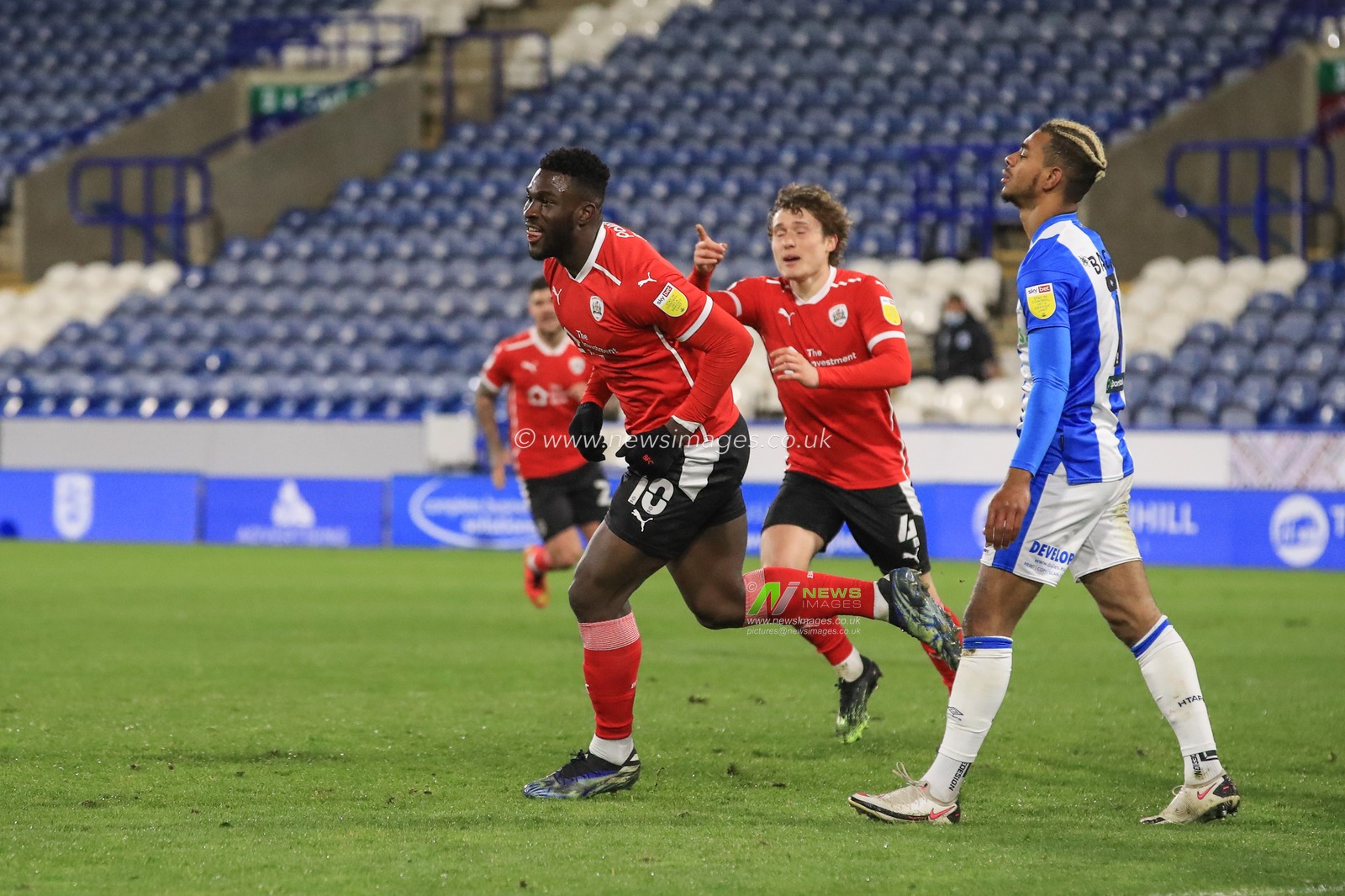 Daryl Dike #10 of Barnsley celebrates his goal to make it 0-1