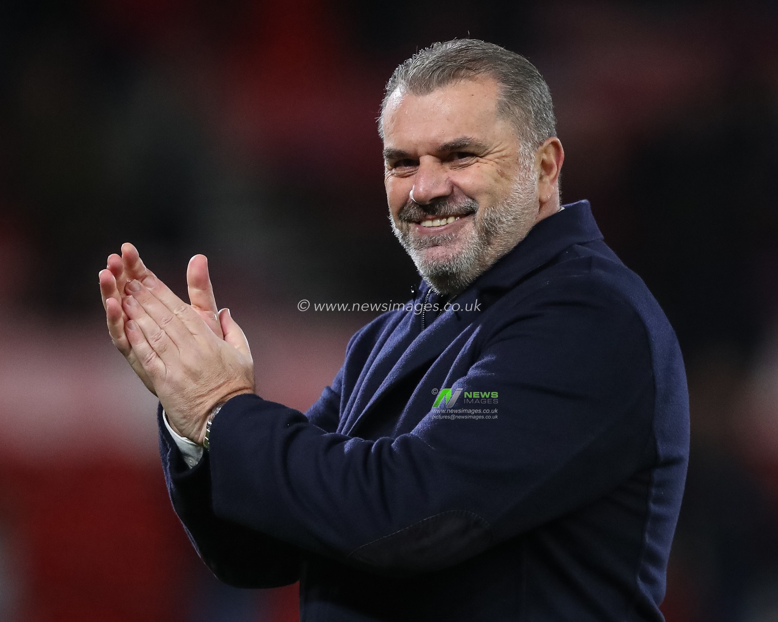 Ange Postecoglou manager of Tottenham Hotspur applauds the traveling fans after winning 0-2 during the Premier League match Nottingham Forest vs Tottenham Hotspur at City Ground, Nottingham, United Kingdom, 15th December 2023

(Photo by Gareth Evans/News Images)