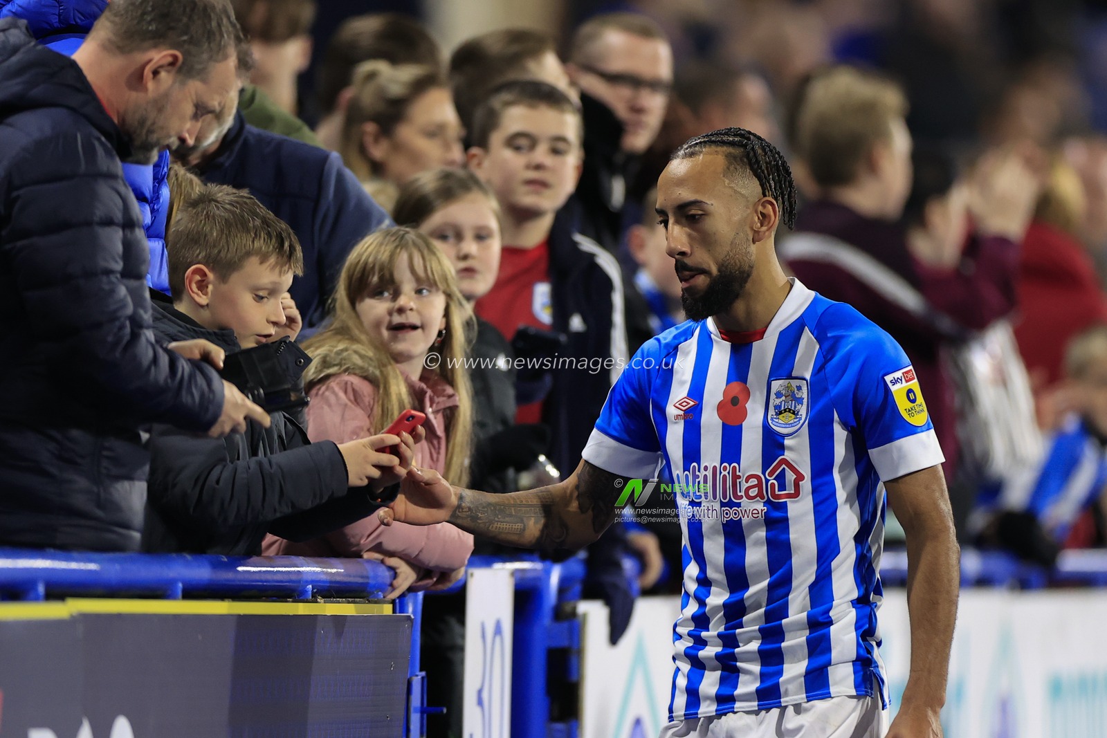 Sorba Thomas #7 of Huddersfield Town with the fans at the end of  the Sky Bet Championship match Huddersfield Town vs Swansea City at John Smith's Stadium, Huddersfield, United Kingdom, 12th November 2022

(Photo by Conor Molloy/News Images)