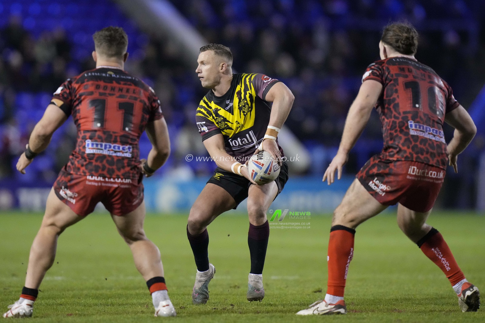 Josh Drinkwater of Warrington Wolves sets to pass during the Rugby League Joe Philbin Testimonial match Warrington Wolves vs Leigh Leopards at Halliwell Jones Stadium, Warrington, United Kingdom, 3rd February 2024

(Photo by Steve Flynn/News Images)