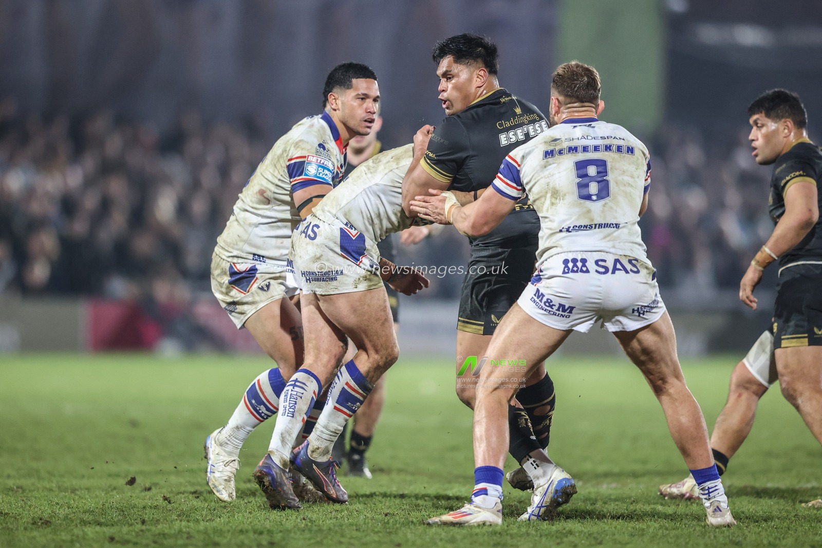 Herman Eseâ€™ese of Hull FC is tackled by Jay Pitts of Wakefield Trinity during the Betfred Super League Round 5 match Wakefield Trinity vs Hull FC at DIY Kitchens Stadium, Wakefield, United Kingdom, 21st March 2025

(Photo by Alfie Cosgrove/News Images)