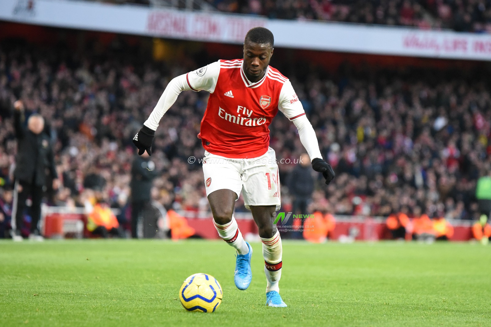 18th January 2020, Emirates Stadium, London, England; Premier League, Arsenal v Sheffield United : Nicolas Pepe (19) of Arsenal with the ball

Credit: Simon Whitehead/News Images