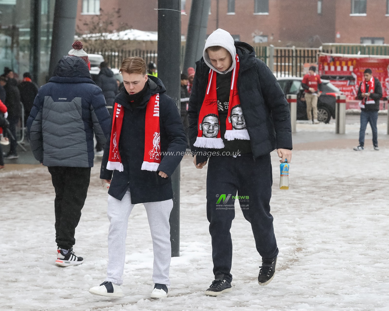 Fans make their way to Anfield in adverse snow and ice conditions during the Premier League match Liverpool vs Manchester United at Anfield, Liverpool, United Kingdom, 5th January 2025

(Photo by Gareth Evans/News Images)
