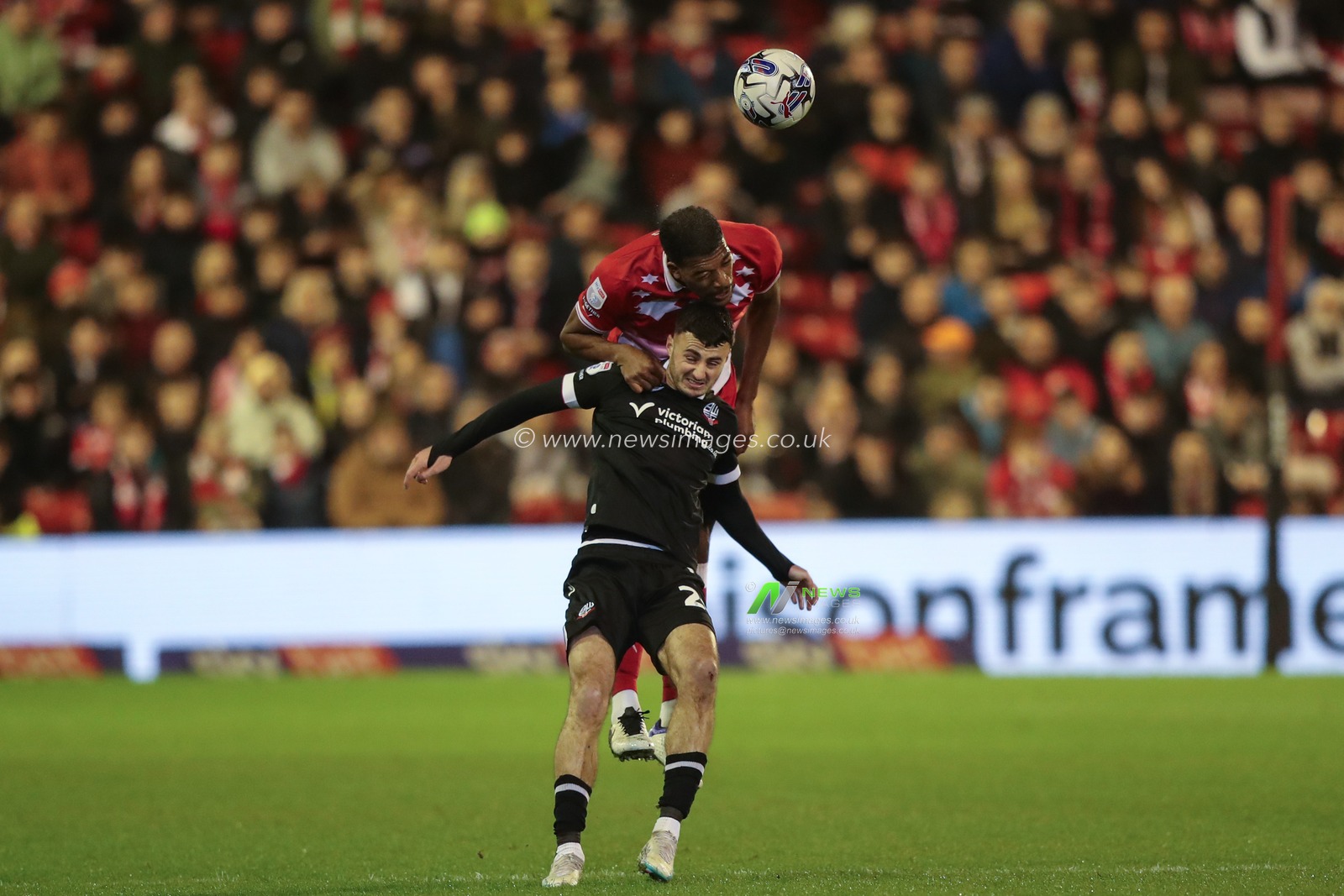 Donovan Pines of Barnsley jumps up to win the high ball during the Sky Bet League 1 match Barnsley vs Bolton Wanderers at Oakwell, Barnsley, United Kingdom, 5th March 2024

(Photo by Alfie Cosgrove/News Images)