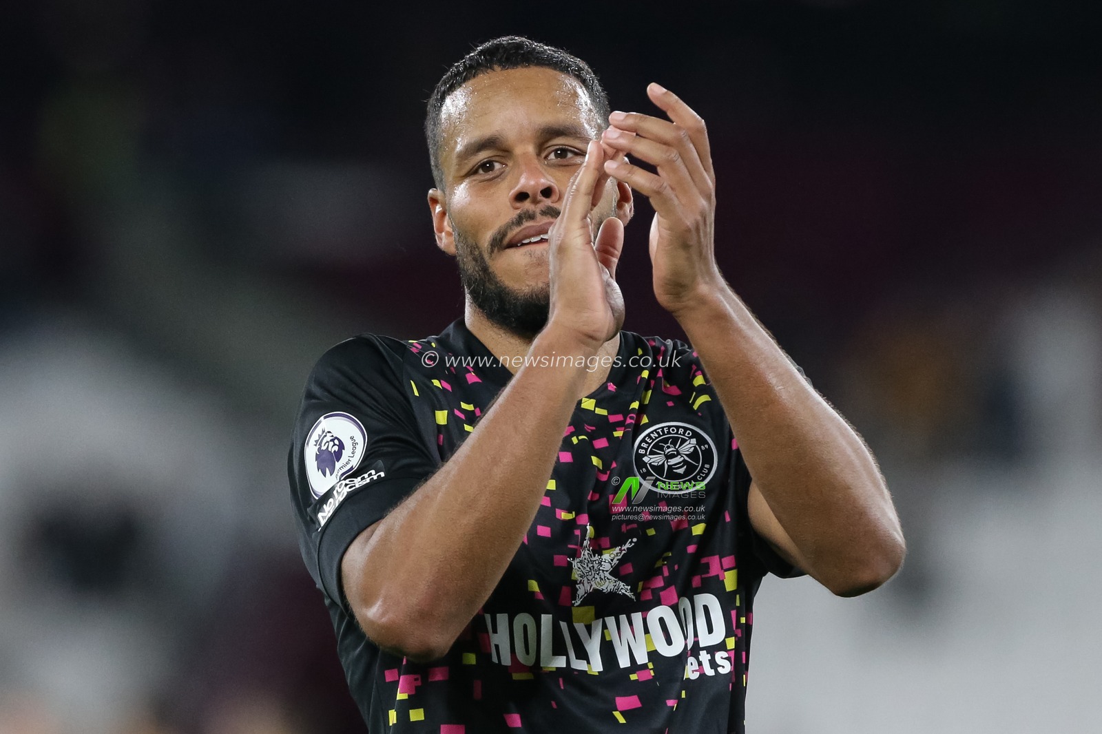 Frank Onyeka #15 of Brentford claps his hands and applauds the supporters at full-time after the Premier League match West Ham United vs Brentford at London Stadium, London, United Kingdom, 30th December 2022

(Photo by Arron Gent/News Images)