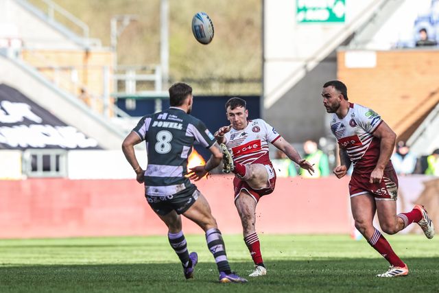 Harry Smith of Wigan Warriors kicks the ball up field during the Betfred Super League round 6 match Wigan Warriors vs Huddersfield Giants at The Brick Community Stadium, Wigan, United Kingdom on 28 March 2026

(Photo by Alfie Cosgrove/News Images)