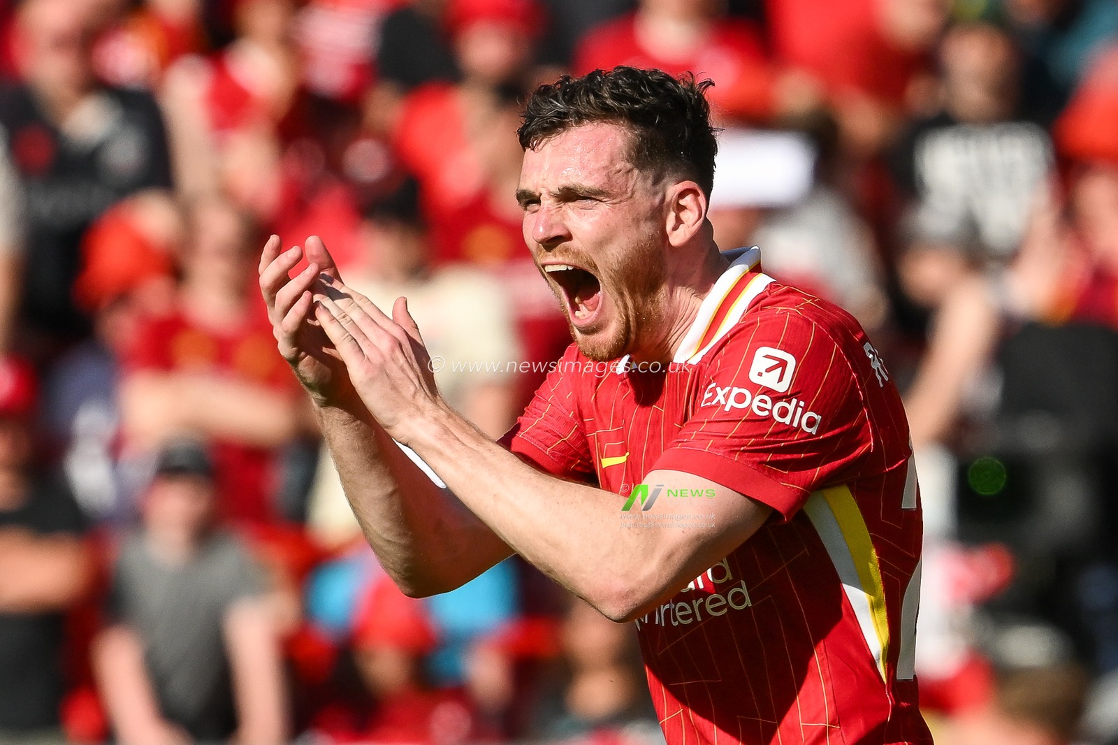 Andrew Robertson of Liverpool encourages his side during the Premier League match Liverpool vs Wolverhampton Wanderers at Anfield, Liverpool, United Kingdom, 19th May 2024

(Photo by Craig Thomas/News Images)