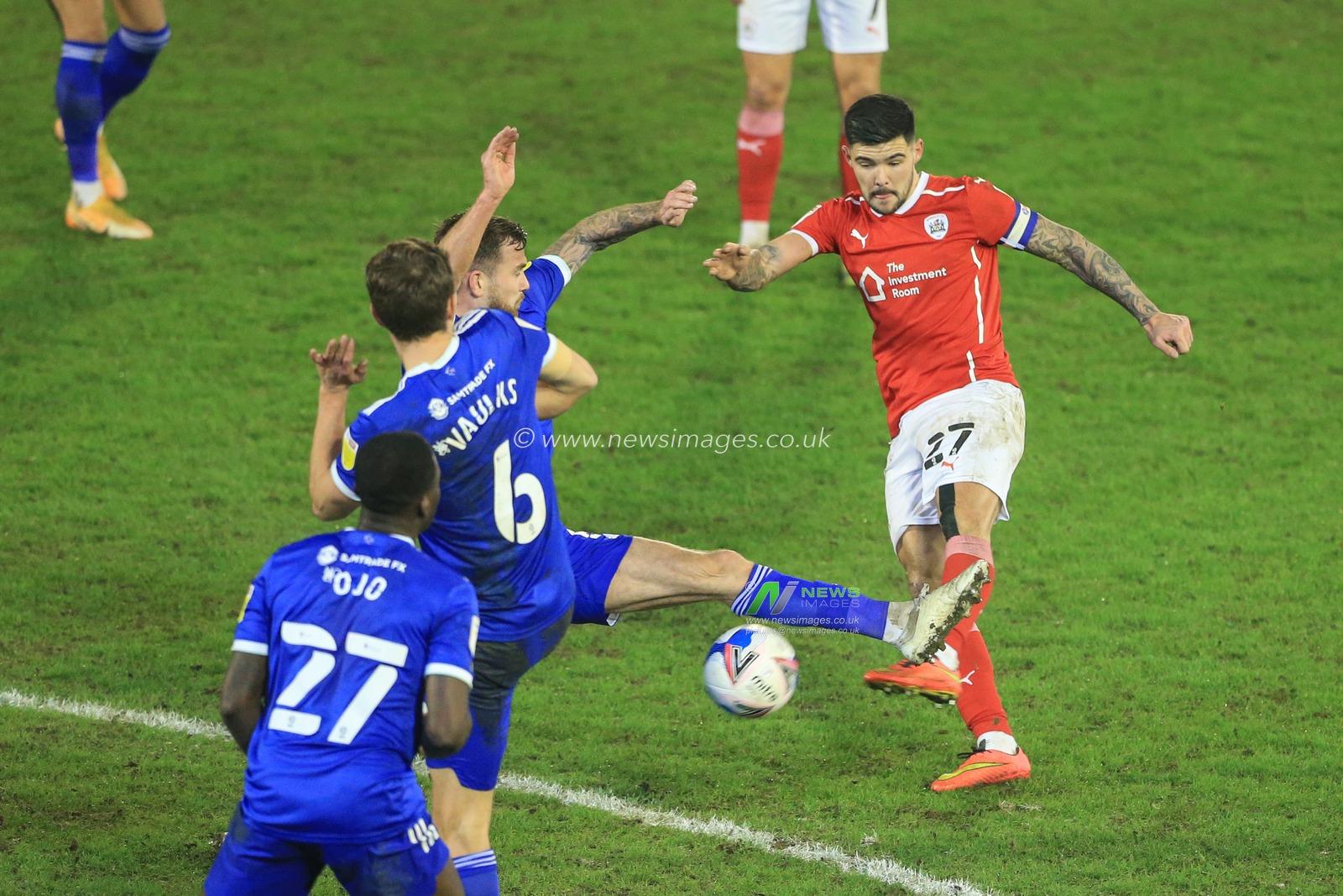 Alex Mowatt #27 of Barnsley shoots on goal