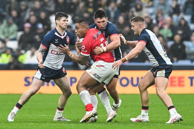 Tevita Tatola of Tonga is tackled by Victor Radley of England during the Rugby League International match England vs Tonga at John Smith's Stadium, Huddersfield, United Kingdom, 28th October 2023

(Photo by Craig Thomas/News Images)