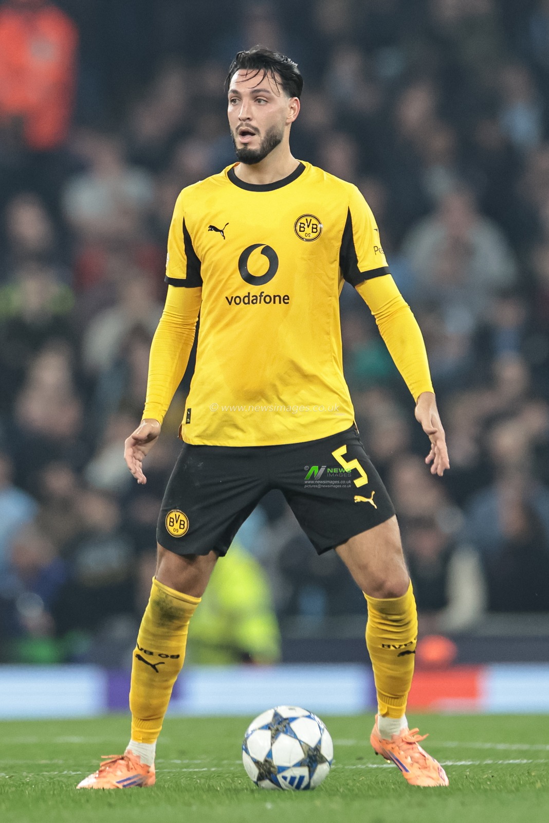 Ramy Bensebaini of Borussia Dortmund with the ball during the UEFA Champions League Matchday 4 of 8 Manchester City vs Borussia Dortmund at the City of Manchester Stadium, Manchester, United Kingdom, 5th November 2025

(Photo by Mark Cosgrove/News Images)

*** GER AUT SUI OUT ***