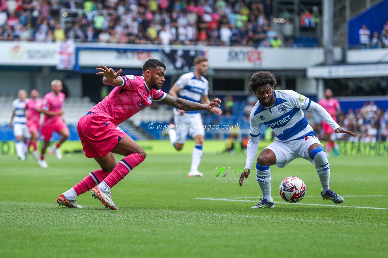 Darnell Furlong of West Bromwich Albion is put under pressure by Kenneth Paal of Queens Park Rangers during the Sky Bet Championship match Queens Park Rangers vs West Bromwich Albion at Kiyan Prince Foundation Stadium, London, United Kingdom, 10th August 2024

(Photo by Izzy Poles/News Images)