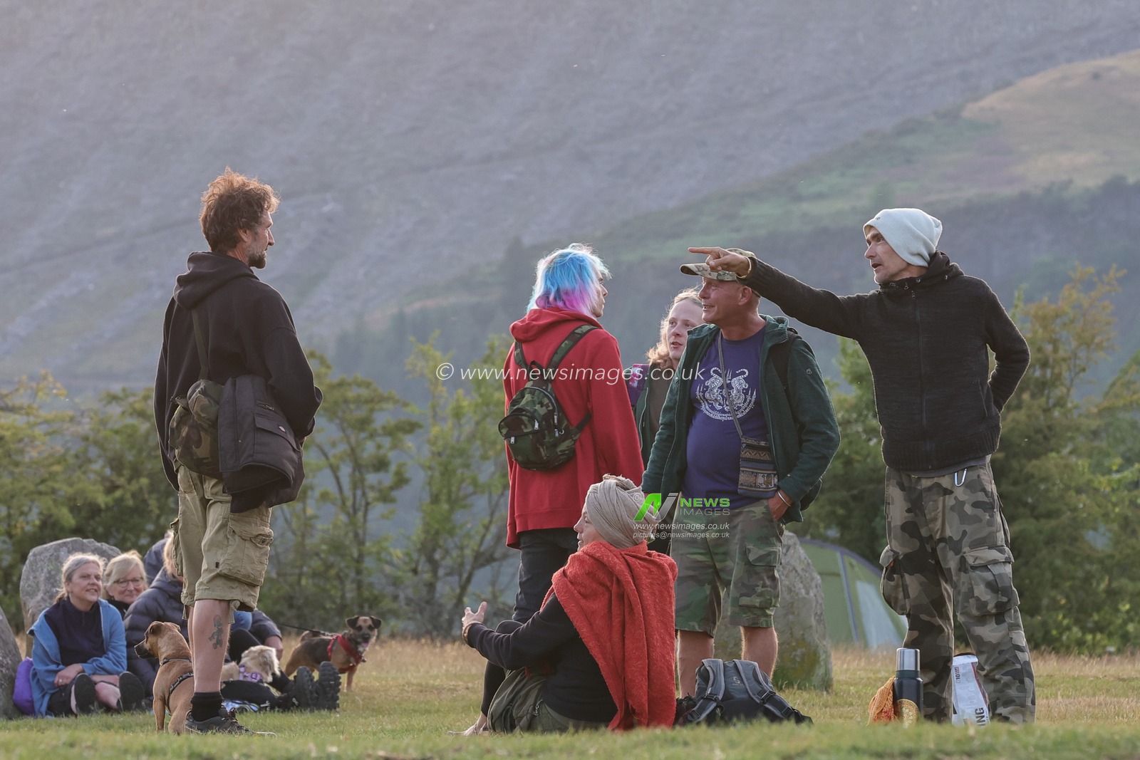 People arrive at Castlerigg Stone Circle Summer Solstice Celebration. It's believed Castlerigg Stone Circle was constructed around 3200 BC, and although its original purpose remains largely unknown, possible uses include a trading post, meeting place, a religious site or an astronomical observatory.Castlerigg Stone Circle, Keswick, United Kingdom, 20th June 2023

(Photo by Alfie Cosgrove/News Images)