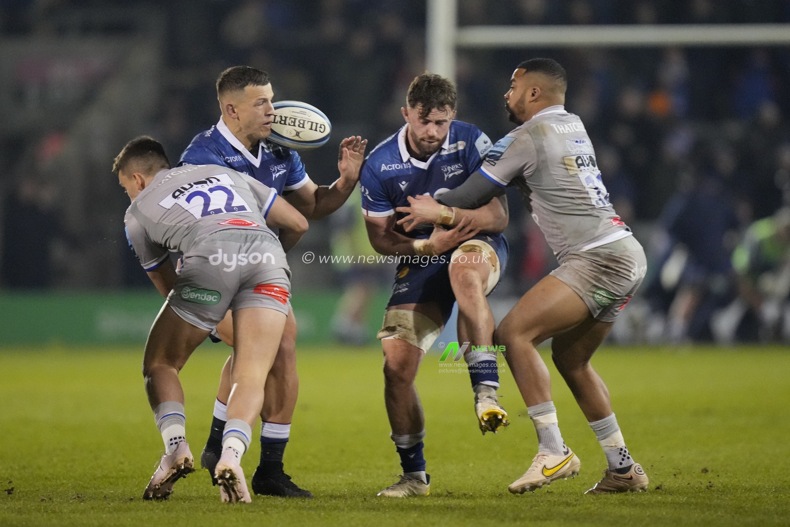 Sam James #13 of Sale Sharks pass to Ryan Mills bounces back of Mills shoulder during the Gallagher Premiership match Sale Sharks vs Bath Rugby at AJ Bell Stadium, Eccles, United Kingdom, 27th January 2023

(Photo by Steve Flynn/News Images)