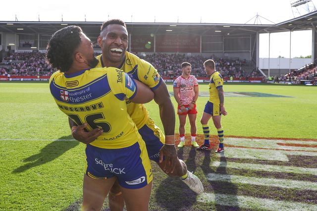 Zane Musgrove of Warrington Wolves and Rodrick Tai of Warrington Wolves celebrate their teams win after the Betfred Challenge Cup Semi-final match Warrington Wolves vs Leigh Leopards at Totally Wicked Stadium, St Helens, United Kingdom, 11th May 2025

(Photo by Gareth Evans/News Images)