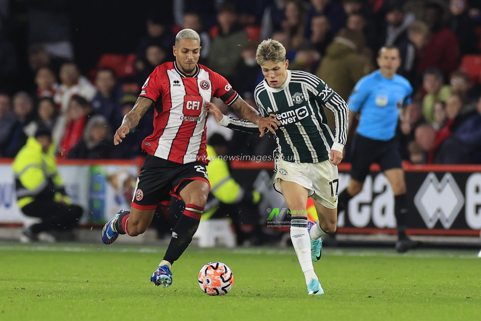 Alejandro Garnacho #17 of Manchester United  and Vinicius Souza #21 of Sheffield United challenge for the ball during the Premier League match Sheffield United vs Manchester United at Bramall Lane, Sheffield, United Kingdom, 21st October 2023

(Photo by Conor Molloy/News Images)
