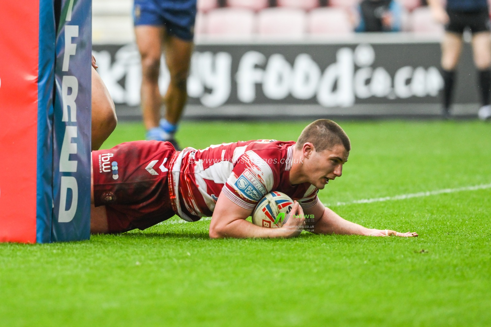 Ethan Havard #16 of Wigan Warriors goes over for a try during the Betfred Super League Round 10 match Wigan Warriors vs Wakefield Trinity at DW Stadium, Wigan, United Kingdom, 23rd April 2023

(Photo by Craig Thomas/News Images)