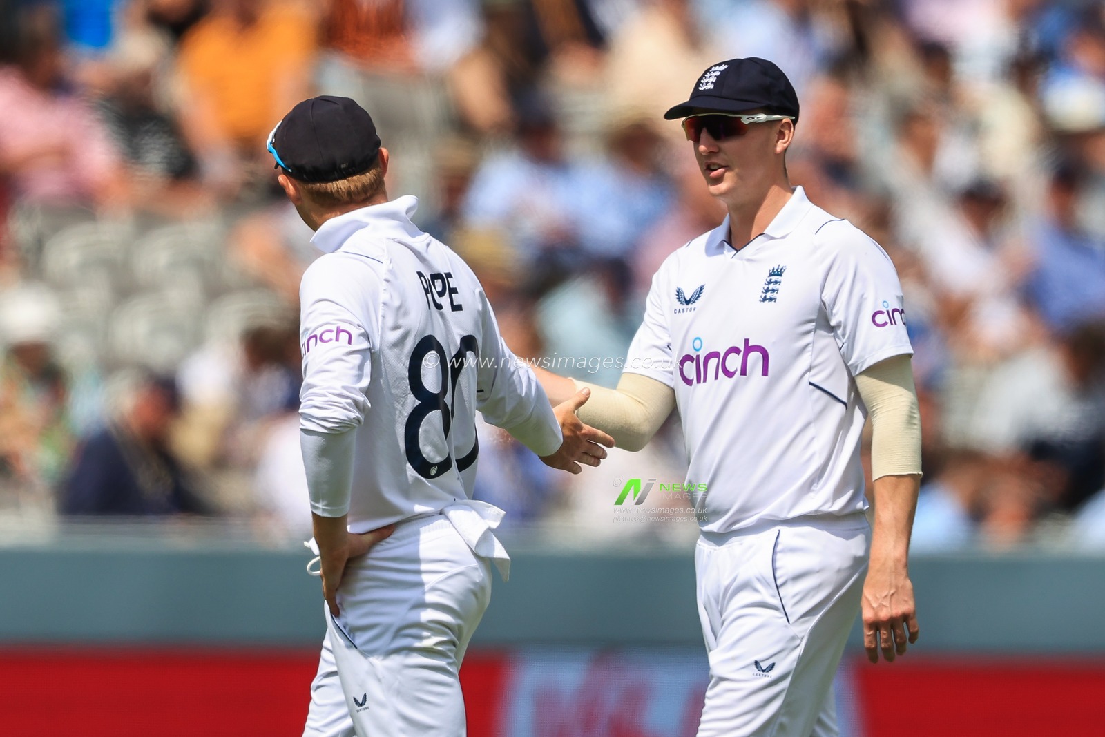 Ollie Pope and Harry Brook of England during the game