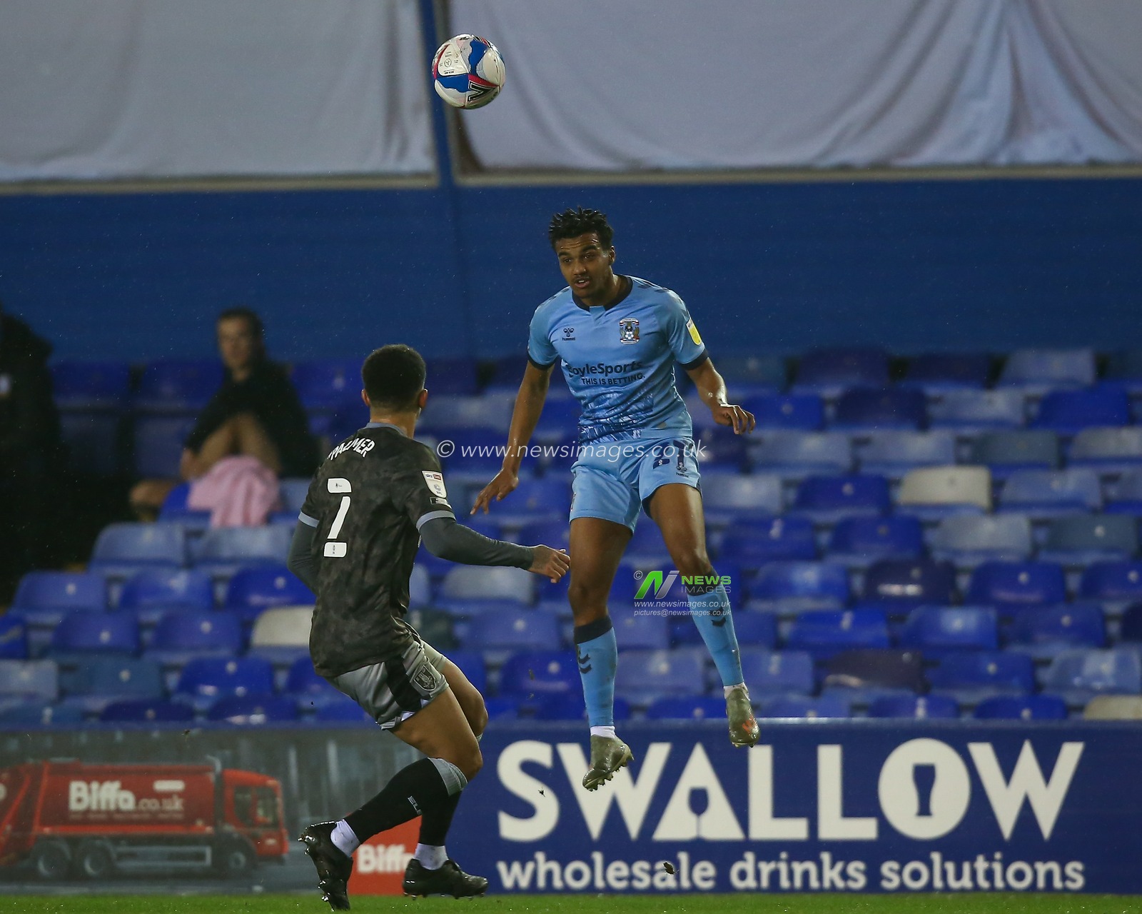 Sam McCallum #21 of Coventry City heads the ball