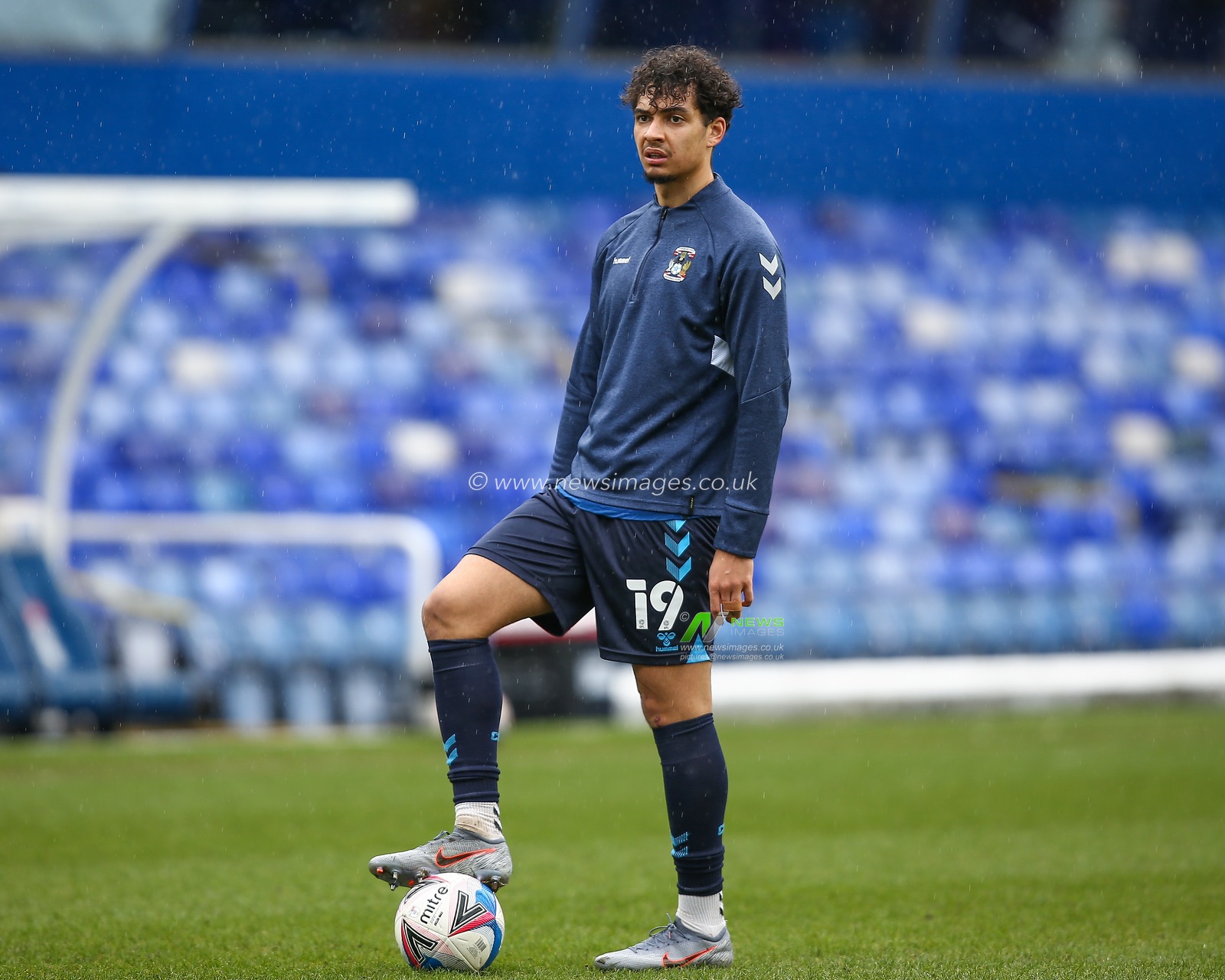 Tyler Walker #19 of Coventry City warming up ahead of the game against Brentford