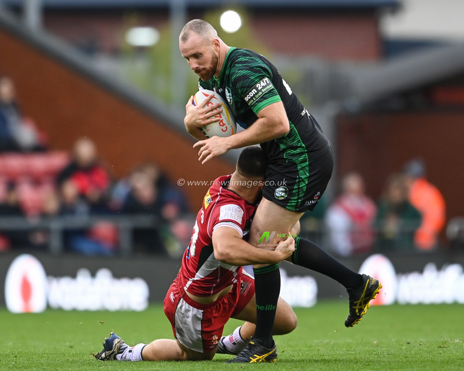 James Hasson of Ireland is tackled by James Roumanos of Lebanon during the Rugby League World Cup 2021 match Ireland vs Lebanon at Leigh Sports Village, Leigh, United Kingdom, 23rd October 2022

(Photo by Craig Thomas/News Images)