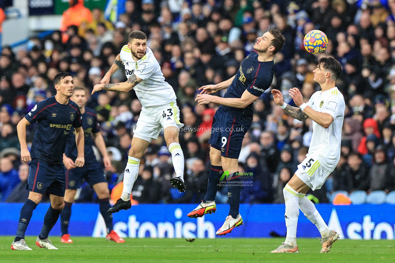 Chris Wood #9 of Burnley heads the ball