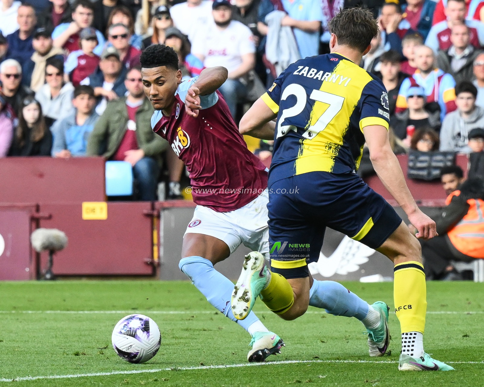 Ollie Watkins of Aston Villa takes on Illya Zabarnyi of Bournemouth during the Premier League match Aston Villa vs Bournemouth at Villa Park, Birmingham, United Kingdom, 21st April 2024

(Photo by Craig Thomas/News Images)