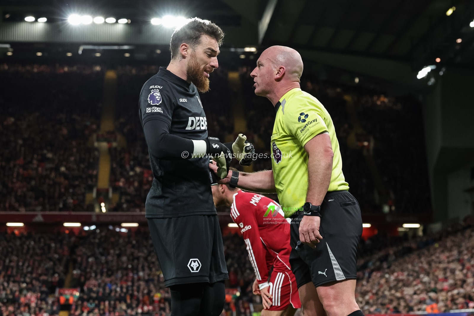 Referee Simon Hooper speaks to Wolverhampton Wanderers goalkeeper Jose Sa after Liverpool win a foul during the Premier League match Liverpool vs Wolverhampton Wanderers at Anfield, Liverpool, United Kingdom, 27th December 2025

(Photo by Mark Cosgrove/News Images)

*** GER AUT SUI OUT ***