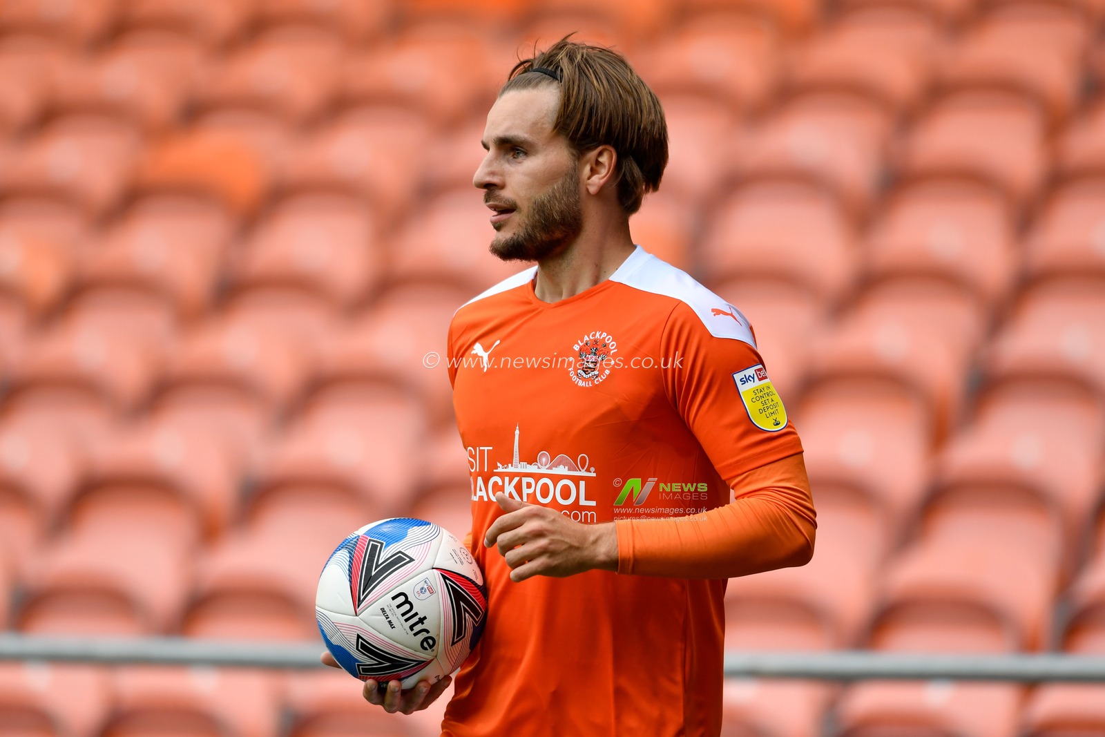 Luke Garbutt (29) of Blackpool prepares to take a throw in