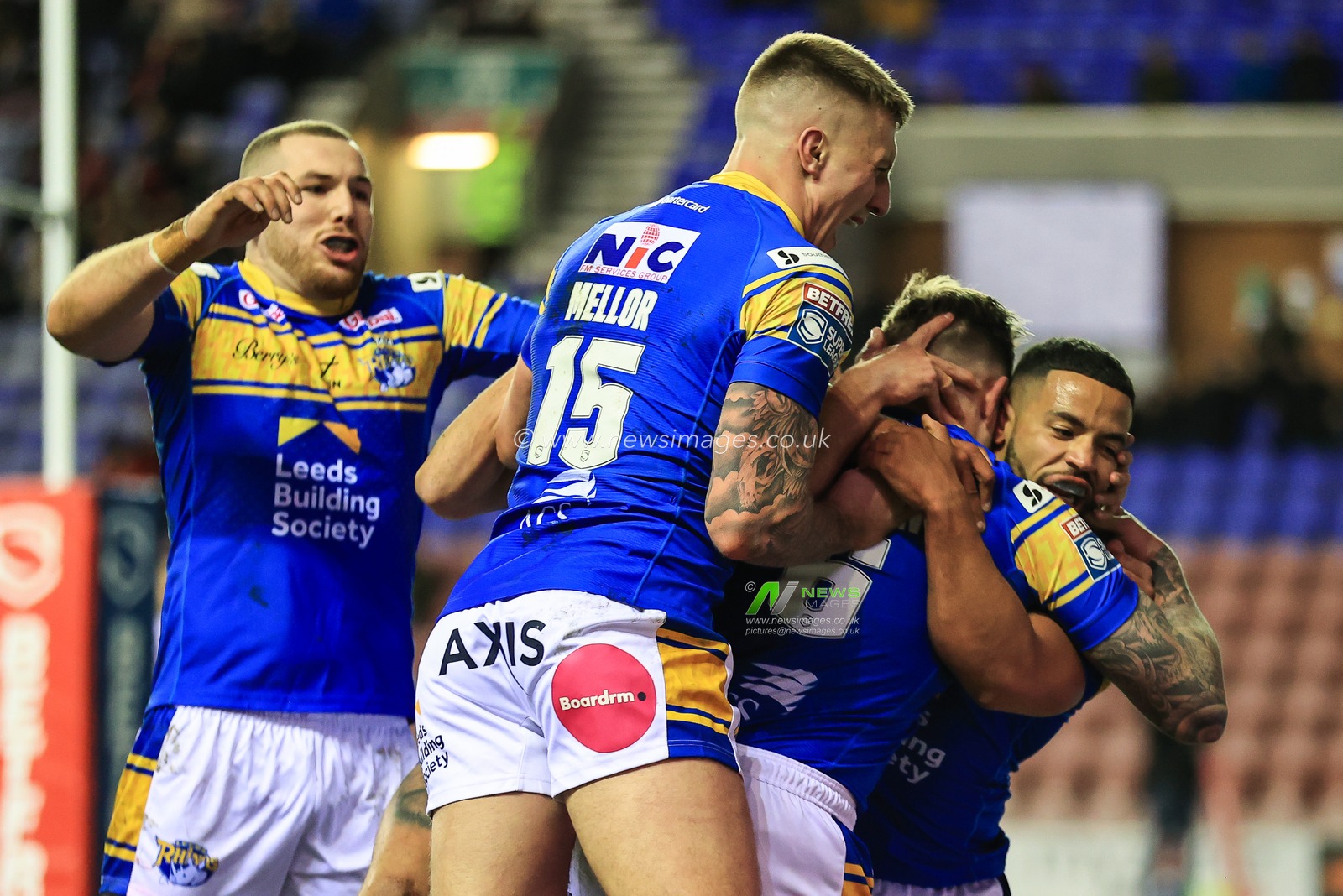 Blake Austin #6 of Leeds Rhinos celebrates his try