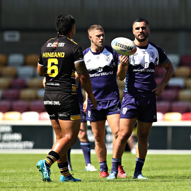 Caleb Aekins of Featherstone Rovers gives the ball to Ata Hingano of York Knights RLFC during the Betfred Championship match York City Knights vs Featherstone Rovers at LNER Community Stadium, York, United Kingdom, 29th June 2025

(Photo by Sam Eaden/News Images)