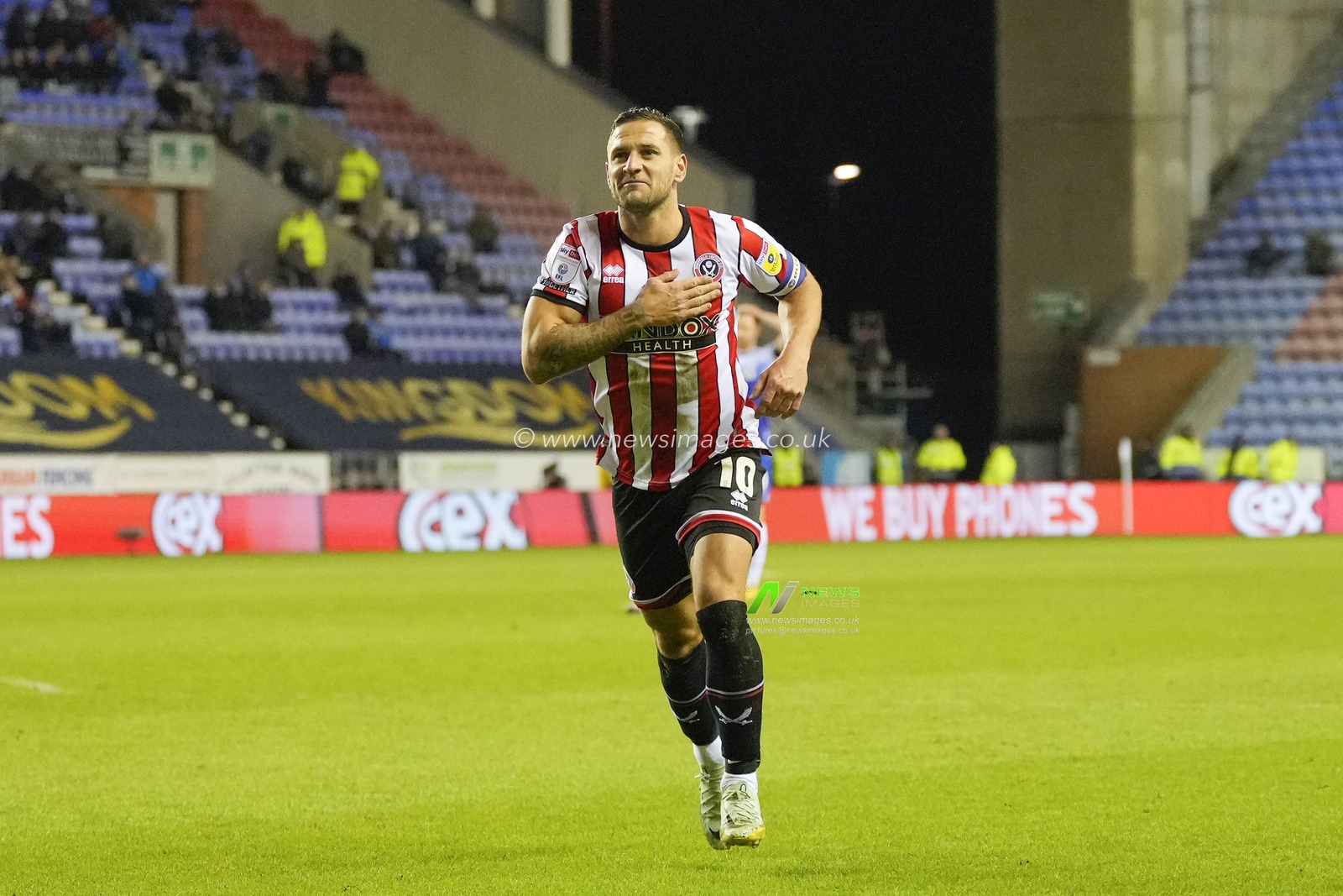 Billy Sharp #10 of Sheffield United runs to the fans to celebrate scoring to make it 0-2 during the Sky Bet Championship match Wigan Athletic vs Sheffield United at DW Stadium, Wigan, United Kingdom, 19th December 2022

(Photo by Steve Flynn/News Images)