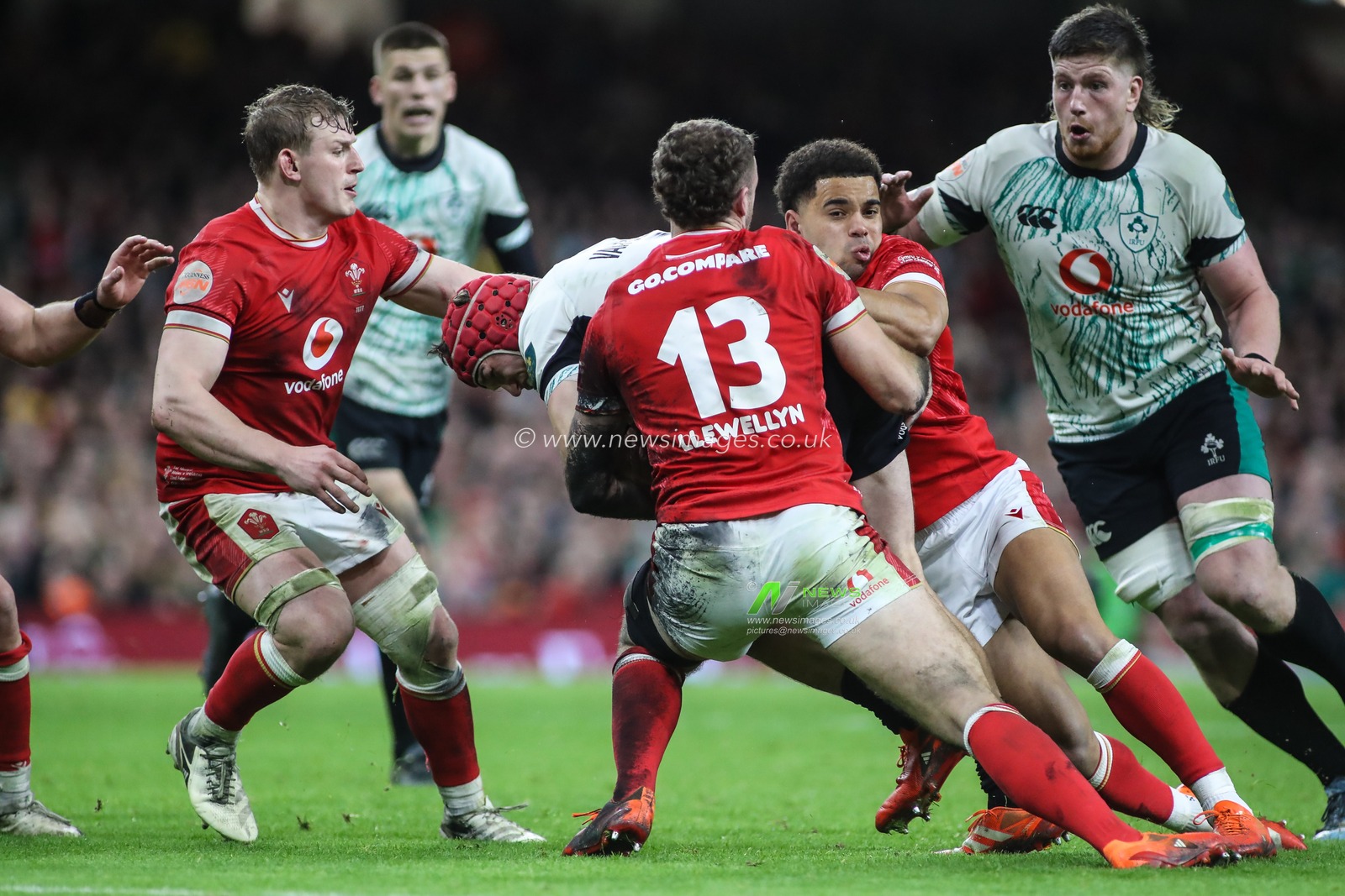 Josh van der Flier of Ireland is tackled by Ben Thomas and Max Llewellyn of Wales during the 2025 Guinness 6 Nations match Wales vs Ireland at Principality Stadium, Cardiff, United Kingdom, 22nd February 2025

(Photo by Andrew Lewis/News Images)