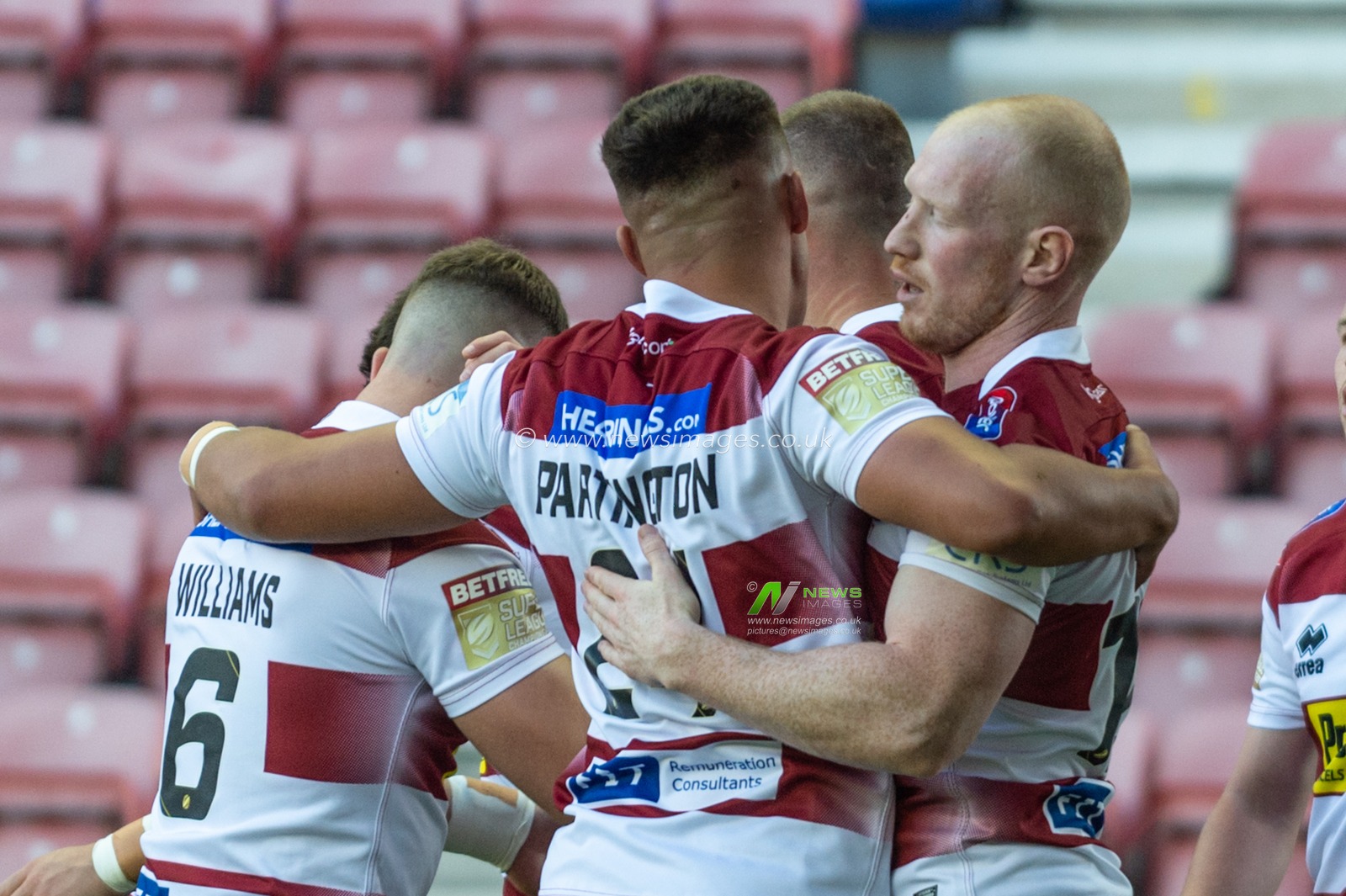 18th July 2019 , DW Stadium, Wigan, England;  Betfred Super League, Round 23, Wigan Warriors vs Wakefield Trinity ; Zak Hardaker of Wigan Warriors celebrates scoring his try with team mates

Credit: Richard Long/News Images