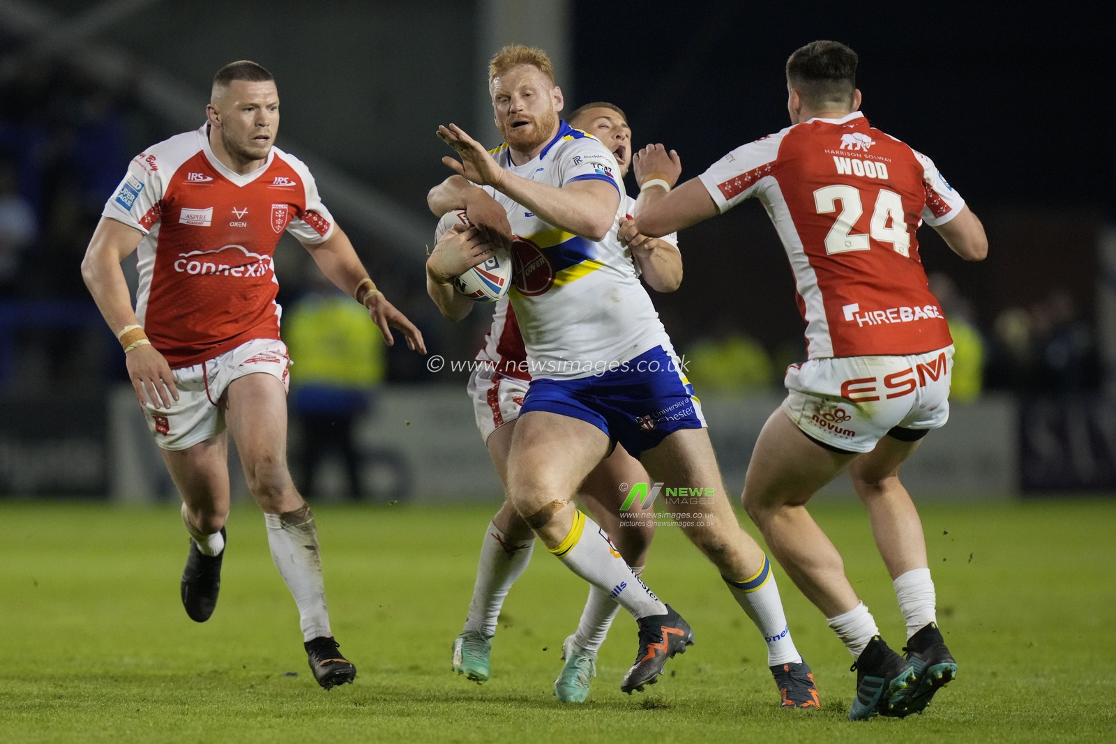 Joe Bullock #19 of Warrington Wolves runs at the Hull KR defence during the Betfred Super LeagueRound 12 match Warrington Wolves vs Hull KR at Halliwell Jones Stadium, Warrington, United Kingdom, 12th May 2023

(Photo by Steve Flynn/News Images)