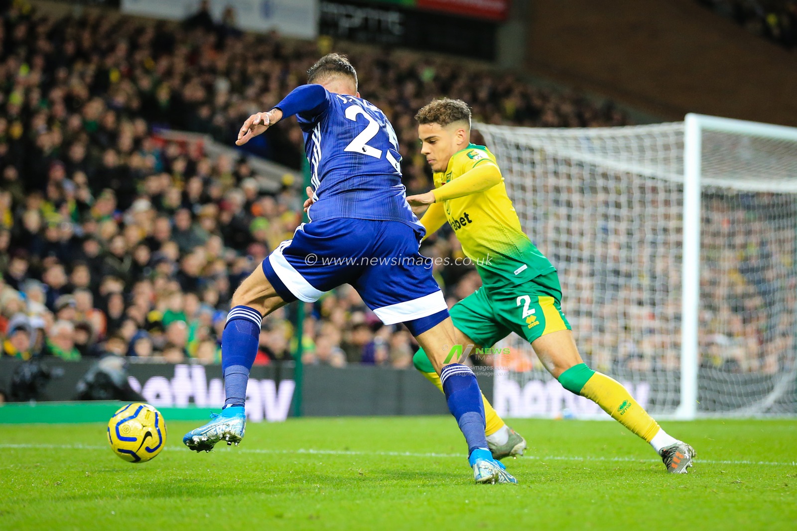8th November 2019, Carrow Road, Norwich, England; Premier League, Norwich City v Watford : Max Aarons (02) of Norwich City tries to stop and advance from Jose Holebas (25) of Watford 

Credit: Georgie Kerr/News Images