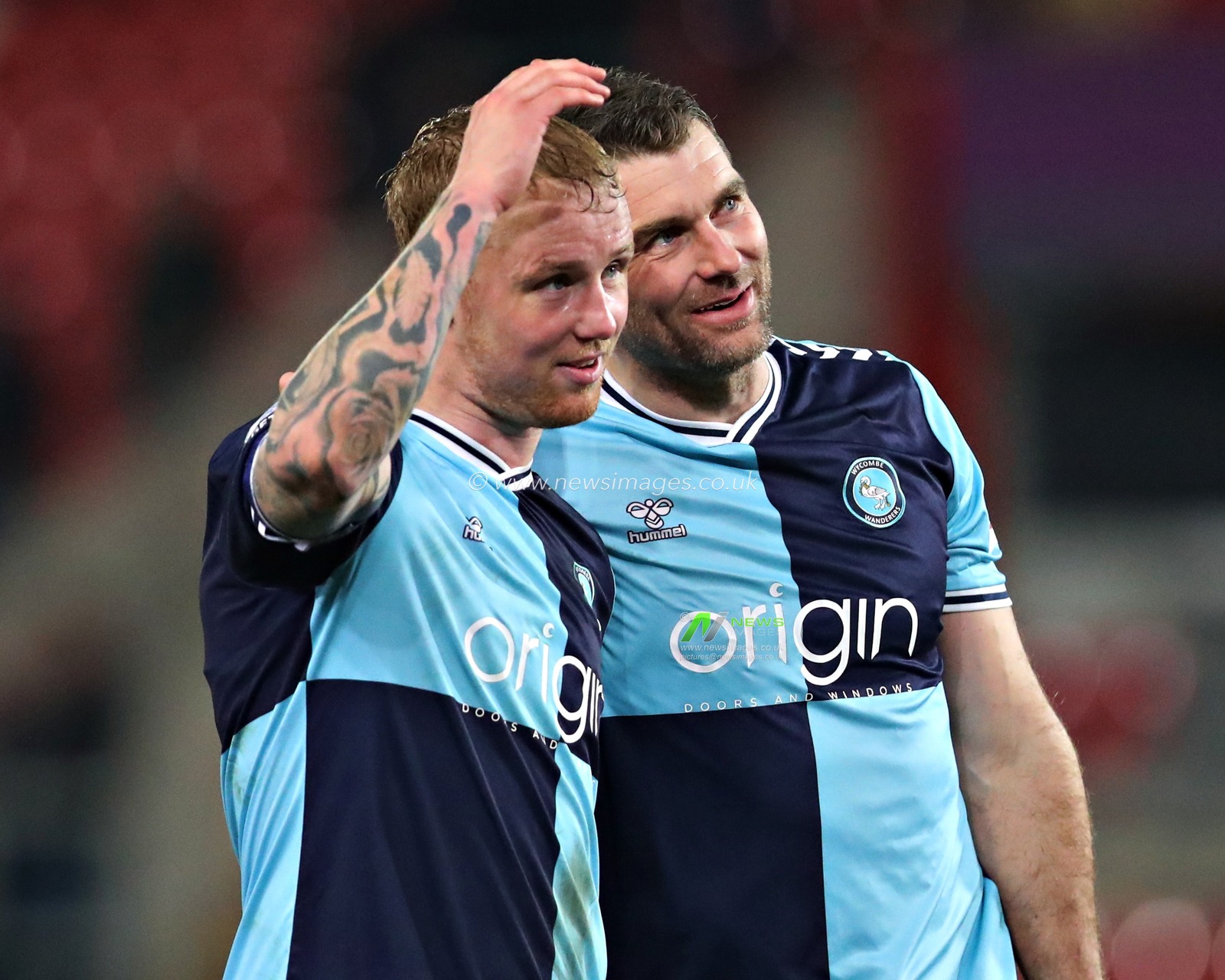 Jack Grimmer of Wycombe Wanderers and Sam Vokes of Wycombe Wanderers applauds the fans after the Sky Bet League 1 match Rotherham United vs Wycombe Wanderers at New York Stadium, Rotherham, United Kingdom, 18th March 2025

(Photo by Sam Eaden/News Images)