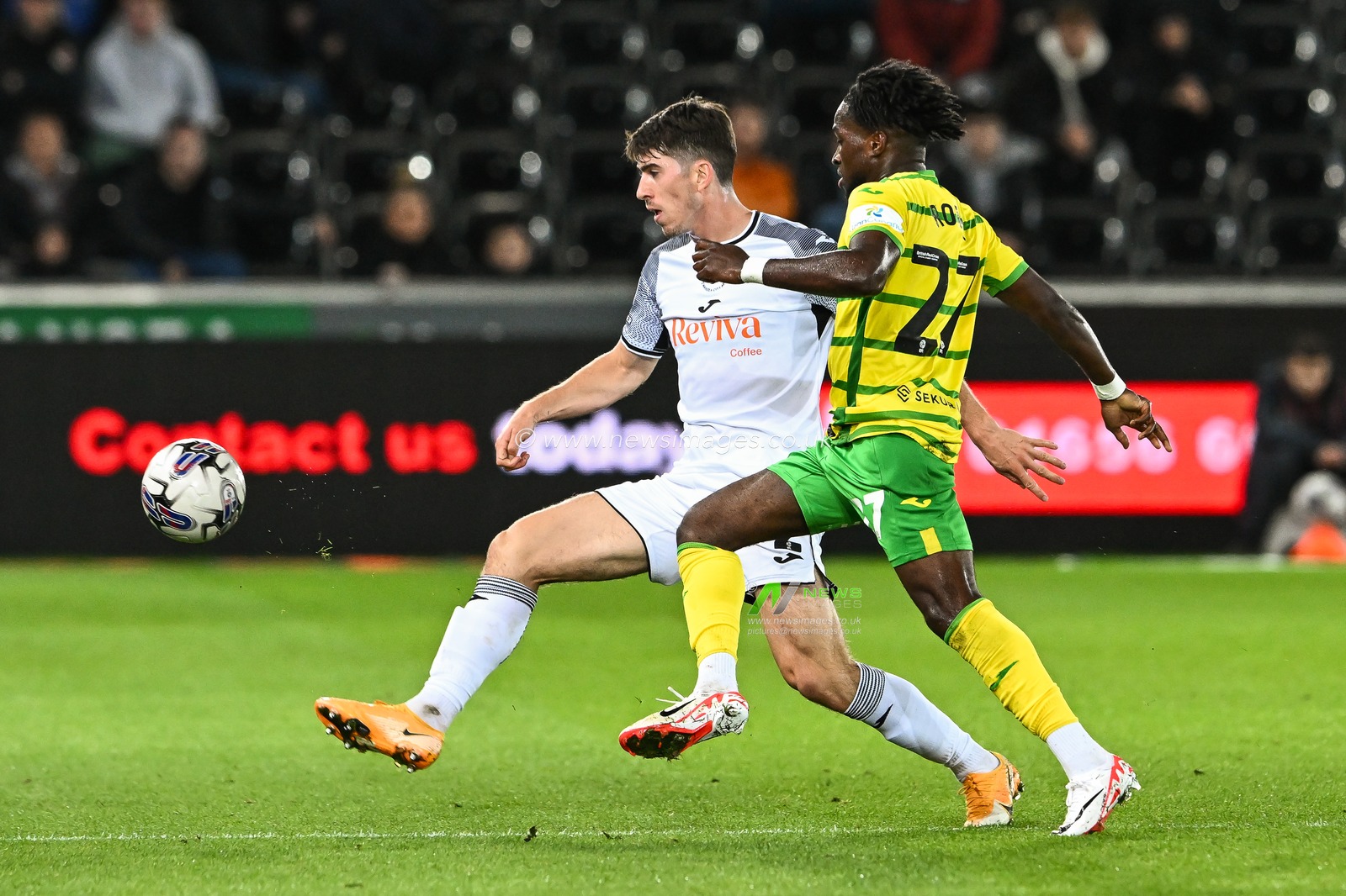 Josh Key #2 of Swansea City battle for the ball with Jonathan Rowe #27 of Norwich City during the Sky Bet Championship match Swansea City vs Norwich City at Swansea.com Stadium, Swansea, United Kingdom, 4th October 2023

(Photo by Craig Thomas/News Images)