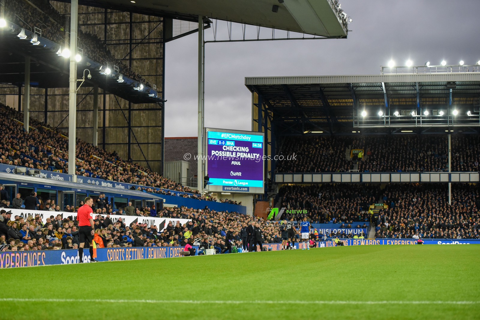 11th January 2020, Goodison Park, Liverpool, England; Premier League, Everton v Brighton and Hove Albion : VAR checks for a possible Everton penalty

Credit: Simon Whitehead/News Images