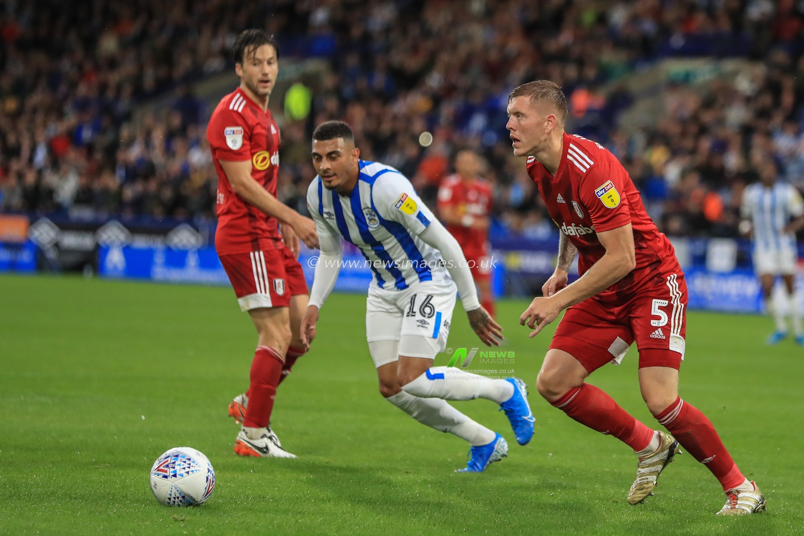 16th August 2019, John Smiths Stadium, Huddersfield England; Sky Bet Championship, Huddersfield Town vs Fulham ; Terence Kongolo (5) of Huddersfield Town clears the ball out of the box as Karlan Grant (16) of Huddersfield Town pressures 


Credit: Mark Cosgrove/News Images

English Football League images are subject to DataCo Licence