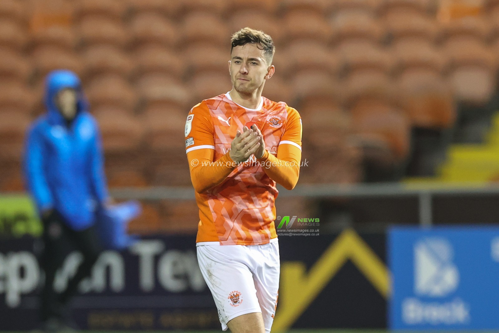Ryan Wintle #8 of Blackpool applauds the fans